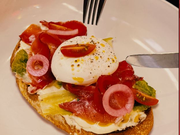 Cured salmon, egg and tomato on toasted sourdough