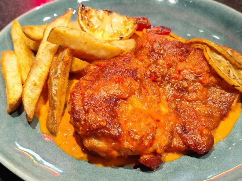 Roasted peri peri chicken with frites and lemon
