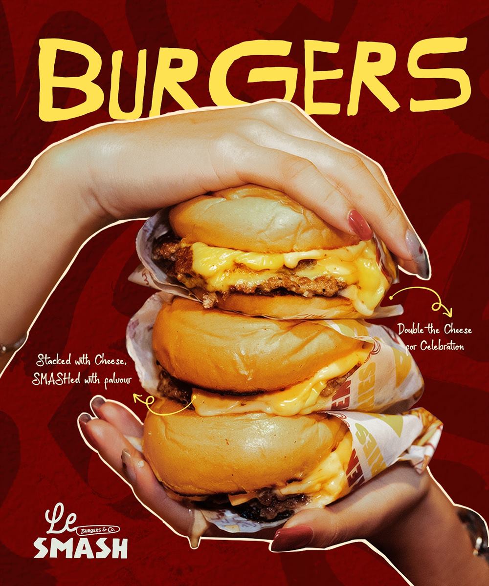 Burgers — three stacked in one hand