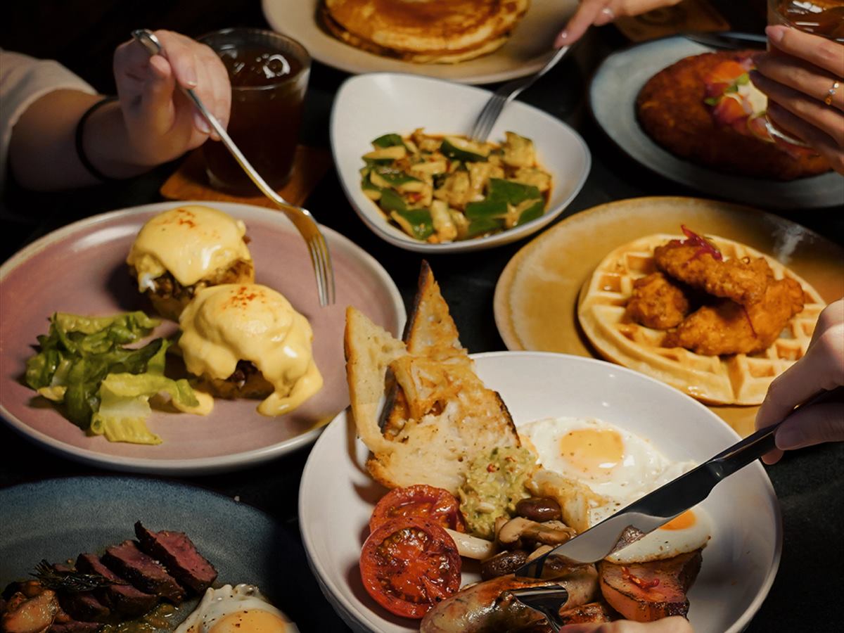 A brunch table spread across several plates