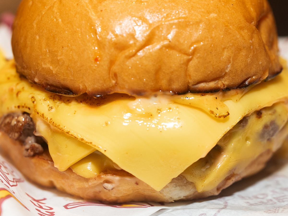 A cheeseburger close enough to count the layers