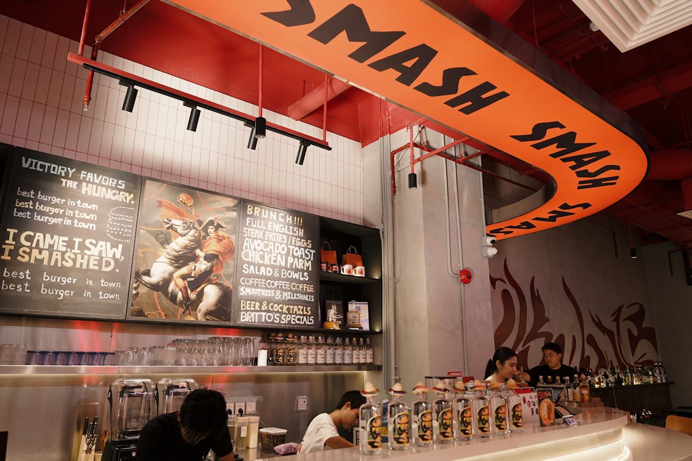 The kitchen seen from the floor, under the hanging sign