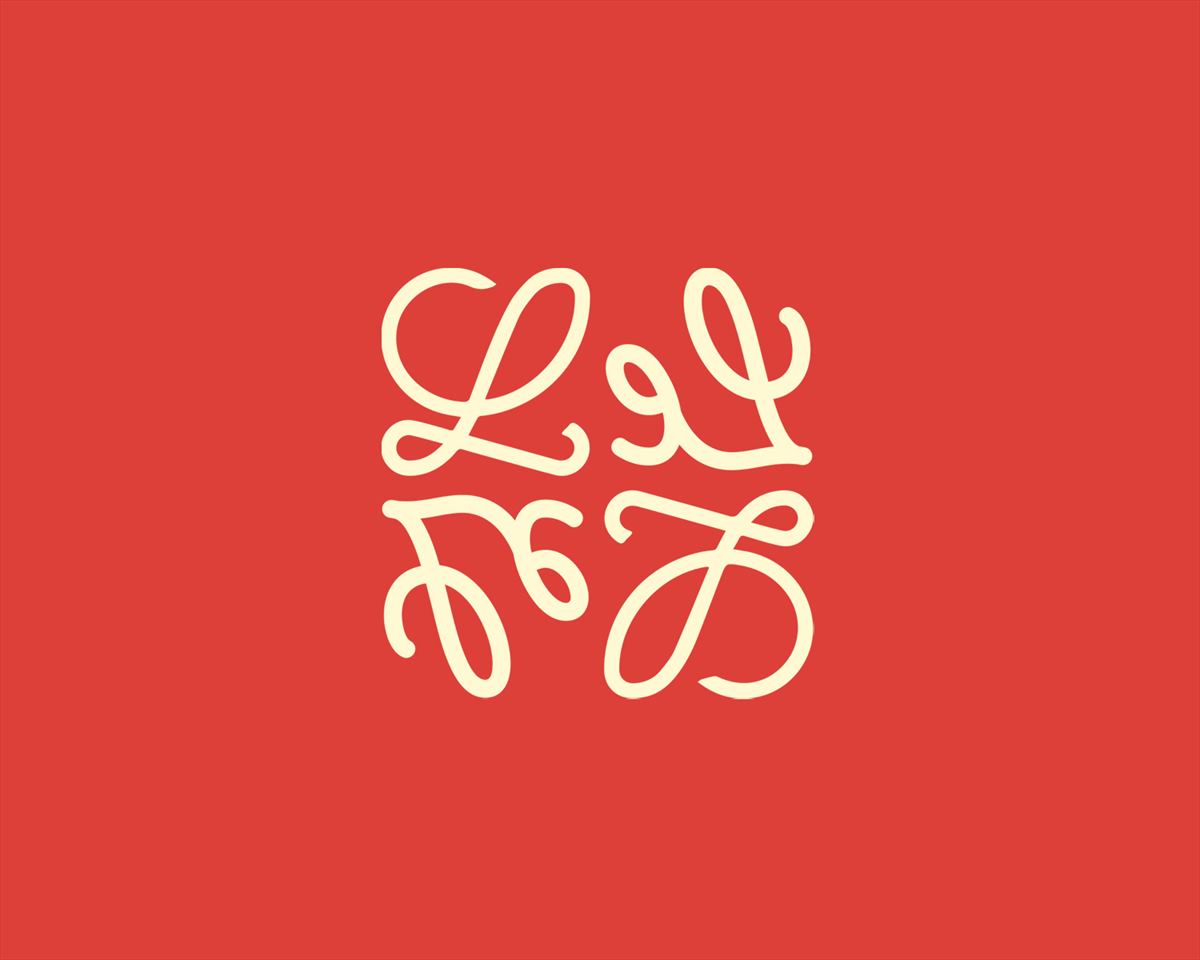 The Le monogram in cream on red