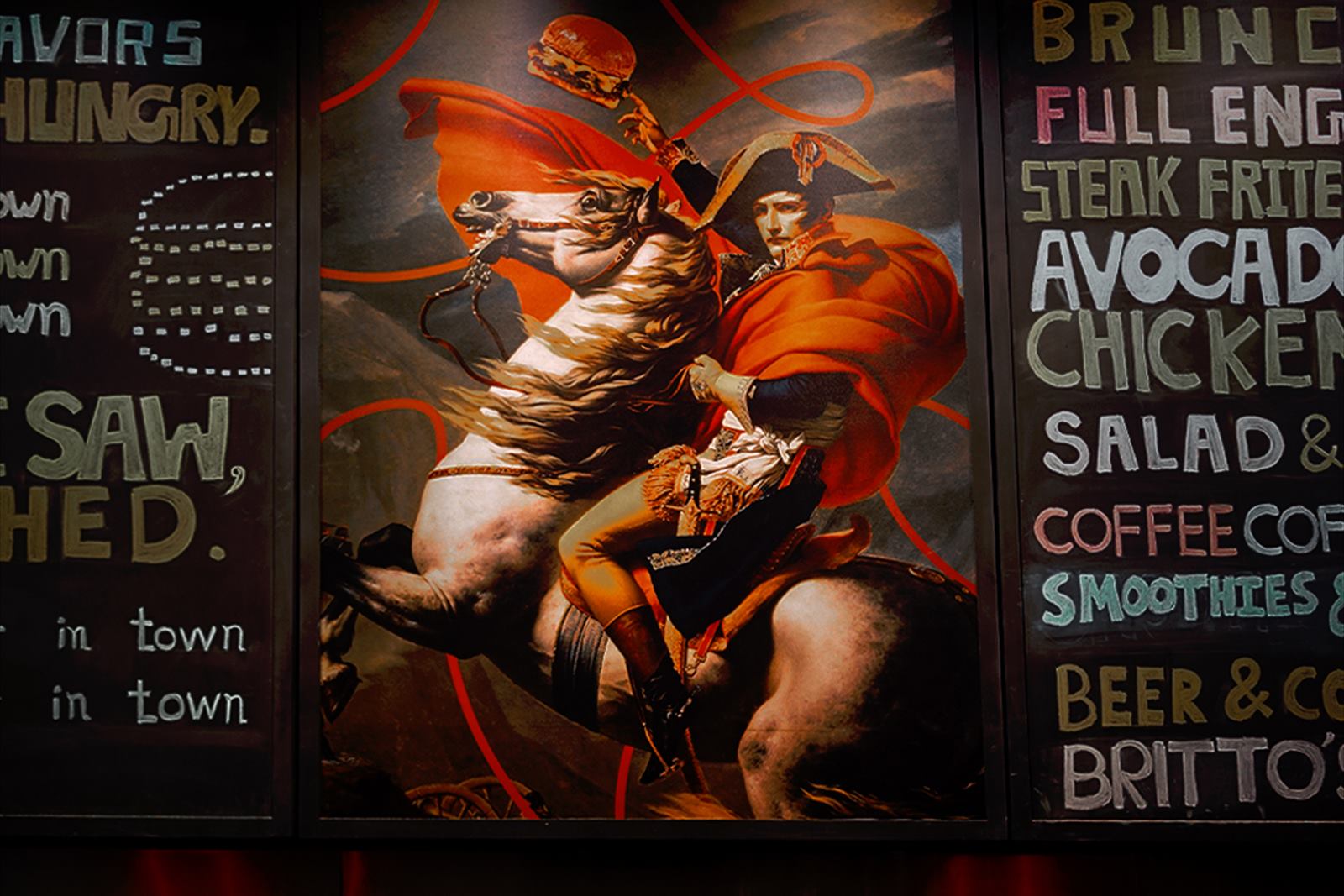 The painted menu wall, beside the framed Napoleon